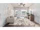 Bright living room with modern furniture, neutral tones, and access to outdoor space at 1825 W Ray Rd # 2132, Chandler, AZ 85224