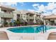 A refreshing community pool with lounge chairs offers a perfect spot for relaxation and leisure at 1825 W Ray Rd # 2132, Chandler, AZ 85224