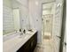 Bright bathroom with a spacious vanity and a glass-enclosed shower at 20171 W Cheery Lynn Rd, Buckeye, AZ 85396