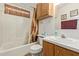 Cozy bathroom featuring a shower-tub combo, vanity, and wood-look flooring at 205 S Higley Rd # 300, Mesa, AZ 85206