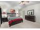 Comfortable bedroom featuring a patterned bed with a modern bedframe and an accenting dresser at 205 S Higley Rd # 300, Mesa, AZ 85206