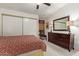 Comfortable bedroom features natural light, ceiling fan, and carpeted floors, creating a peaceful retreat at 205 S Higley Rd # 300, Mesa, AZ 85206