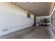 Large carport provides covered parking and easy access to the residence at 205 S Higley Rd # 300, Mesa, AZ 85206