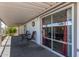 Relaxing covered porch with a table and chairs, perfect for enjoying the outdoors and relaxing at 205 S Higley Rd # 300, Mesa, AZ 85206