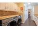 Laundry room with granite countertops and Samsung washer and dryer at 21231 E Nightingale Rd, Queen Creek, AZ 85142