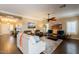 Spacious living room featuring tile floors, comfortable seating, and bright, natural light at 21231 E Nightingale Rd, Queen Creek, AZ 85142