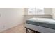Small bedroom with a full bed and window with blinds at 214 W June Cir, Mesa, AZ 85201