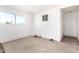 Garage featuring natural light from the window, with plenty of open space at 214 W June Cir, Mesa, AZ 85201