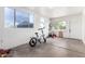 Garage featuring natural light from the window, with plenty of storage space at 214 W June Cir, Mesa, AZ 85201
