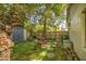 Charming backyard area featuring a storage shed, cozy seating, and well-maintained landscaping at 220 E 14Th St, Tempe, AZ 85281
