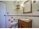 Charming bathroom with decorative wall tile and classic fixtures at 220 E 14Th St, Tempe, AZ 85281
