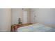 This is a cozy bedroom showcasing the bed, chair, and doors at 220 E 14Th St, Tempe, AZ 85281
