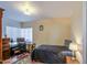 Bright bedroom with a desk, chair and a large window at 220 E 14Th St, Tempe, AZ 85281