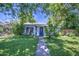 A charming home with a well-manicured lawn and mature trees, offering inviting curb appeal at 220 E 14Th St, Tempe, AZ 85281
