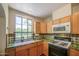 Bright kitchen featuring colorful countertops, classic appliances, and a scenic window at 220 E 14Th St, Tempe, AZ 85281