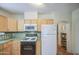 Functional kitchen with classic appliances and convenient archway access at 220 E 14Th St, Tempe, AZ 85281