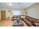 Bright living room with a comfortable leather sectional and lots of natural light at 220 E 14Th St, Tempe, AZ 85281