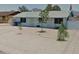 Modest single-story home featuring a low maintenance front yard with sparse landscaping in a sunny neighborhood at 2395 S Arizona Rd, Apache Junction, AZ 85119