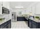 Well-lit kitchen features stainless steel appliances, granite countertops, and ample cabinet space at 2395 S Arizona Rd, Apache Junction, AZ 85119
