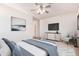 Bright bedroom featuring neutral walls, contemporary decor, and stylish bedside tables at 3016 N 109Th Ave, Avondale, AZ 85392