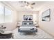 Spacious bedroom featuring plush bedding, neutral walls, and plenty of natural light at 3016 N 109Th Ave, Avondale, AZ 85392