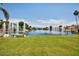 Beautiful lake view featuring multiple fountains and lush green space, perfect for relaxation and recreation at 3016 N 109Th Ave, Avondale, AZ 85392