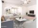 Bright living room with modern decor, neutral color palette, and comfortable seating arrangement at 3016 N 109Th Ave, Avondale, AZ 85392
