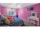 Bright bedroom featuring a vanity, and blue pattern bedspread at 3436 E Gary Way, Gilbert, AZ 85234