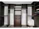 Walk-in closet with custom shelving and drawers, offering ample storage and organization options at 3436 E Gary Way, Gilbert, AZ 85234