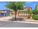 Two-story home featuring a two-car garage, well-maintained landscaping with rocks, and a basketball hoop in the driveway at 3436 E Gary Way, Gilbert, AZ 85234