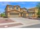 Two-story home featuring a two-car garage, well-maintained landscaping, and a basketball hoop in the driveway at 3436 E Gary Way, Gilbert, AZ 85234