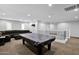 Large game room featuring a pool table, comfortable sofa, recessed lighting, and a staircase at 3436 E Gary Way, Gilbert, AZ 85234