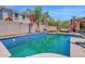 Backyard view of pool and deck with outdoor furniture at 3436 E Gary Way, Gilbert, AZ 85234