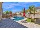 Outdoor space with pool, lush landscaping, and plenty of lounge chairs at 3436 E Gary Way, Gilbert, AZ 85234