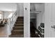 Carpeted staircase with white banister and iron spindles leading to upper level at 3436 E Gary Way, Gilbert, AZ 85234