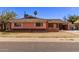 Charming single-story home with brick accents at 3823 W Berridge Ln, Phoenix, AZ 85019
