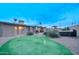 Backyard with putting green and patio area, offering a recreational outdoor space at 4008 N 85Th St, Scottsdale, AZ 85251