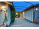 Pathway to house with stone pavers, desert plants, and overhead structure at 4008 N 85Th St, Scottsdale, AZ 85251