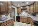 Functional kitchen offering granite counters, stainless appliances, and ample cabinet space at 4008 N 85Th St, Scottsdale, AZ 85251