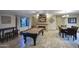 Recreation room with pool table, TV, bar table and dining area, perfect for entertaining at 4008 N 85Th St, Scottsdale, AZ 85251