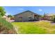 Lush backyard with a covered patio, perfect for outdoor enjoyment at 4100 S Dewdrop Ct, Gilbert, AZ 85297