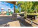 Outdoor community barbecue area next to the playground with picnic tables at 4100 S Dewdrop Ct, Gilbert, AZ 85297
