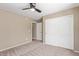 Comfortable bedroom with plush carpet and plenty of closet space at 4100 S Dewdrop Ct, Gilbert, AZ 85297