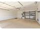 Spacious garage with epoxy floor and plenty of room for storage at 4100 S Dewdrop Ct, Gilbert, AZ 85297