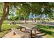 Park featuring picnic tables and a playground at 4100 S Dewdrop Ct, Gilbert, AZ 85297