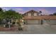 Charming two-story home featuring a two-car garage and well-maintained landscaping at 4306 E Amberwood Dr, Phoenix, AZ 85048