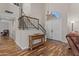 Elegant foyer with hardwood floors, staircase, and a view of the entryway at 4306 E Amberwood Dr, Phoenix, AZ 85048