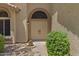 Inviting front entrance with double doors, complemented by a landscaped walkway at 4306 E Amberwood Dr, Phoenix, AZ 85048