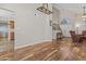 Spacious living room featuring hardwood floors and a vaulted ceiling at 4306 E Amberwood Dr, Phoenix, AZ 85048