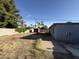 Spacious backyard with mature trees and a privacy fence, offering a serene outdoor retreat at 4310 N 42Nd Pl, Phoenix, AZ 85018